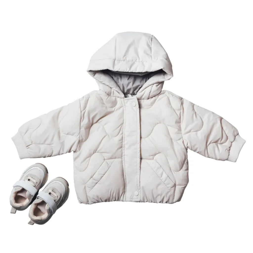 A white Snoopy Puffer Jacket and shoes.